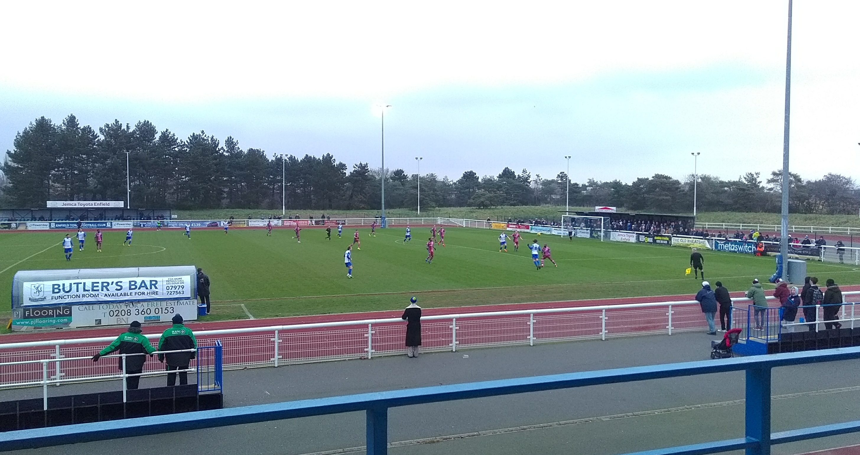 Enfield Town FC competing at Queen Elizabeth II Stadium in Donkey Lane