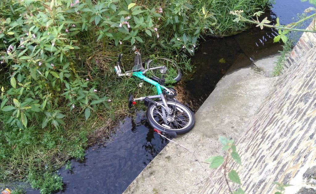 A Beryl hire bike dumped in the Turkey Brook near Enfield Lock