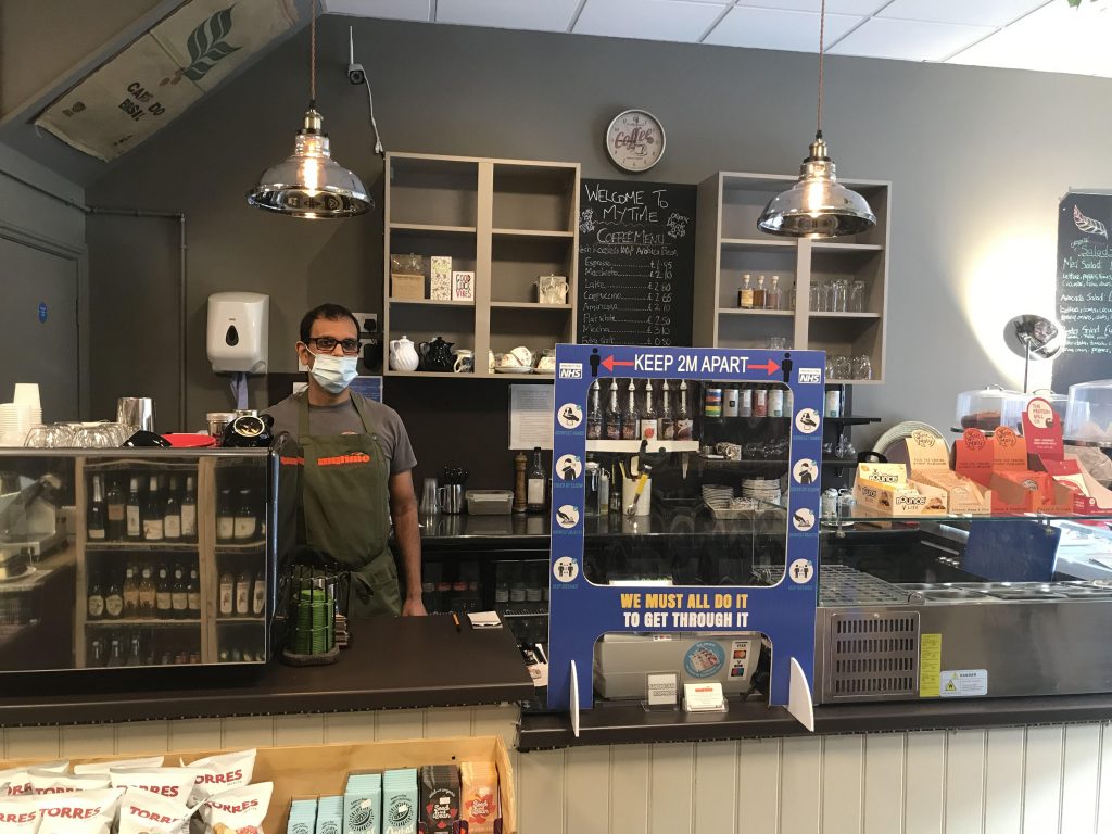 Brian Lewis behind the counter at My Time in Palmers Green