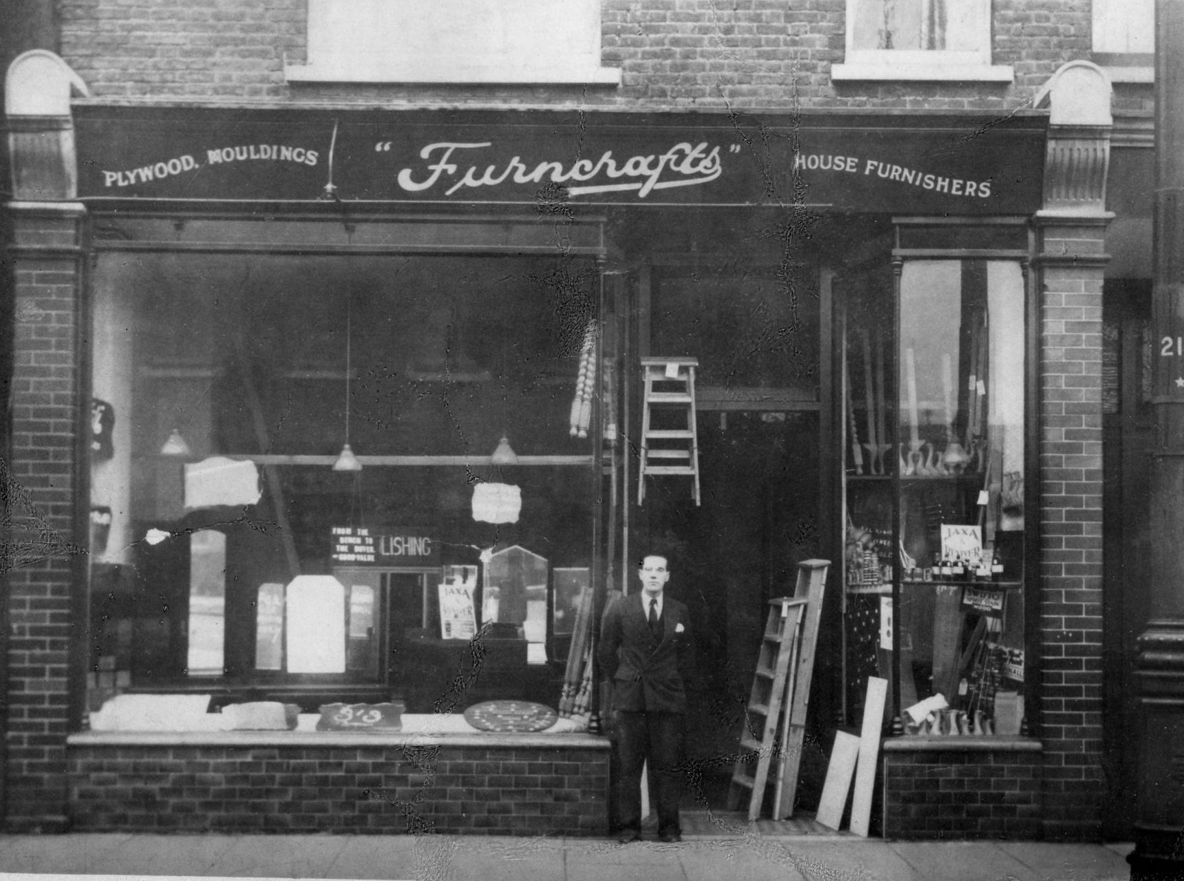 Fred Rolland standing outside Furncrafts shortly after it opened in 1933
