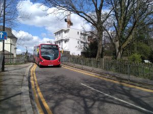 The 456 bus pictured on the single-lane bridge in Farm Road, Winchmore Hill