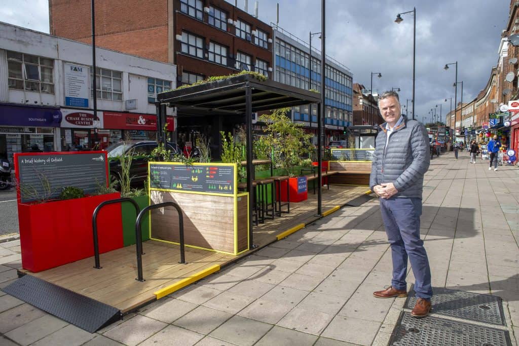 Deputy leader Ian Barnes beside the new 'parklet' in Chase Side, Southgate (credit Enfield Council)