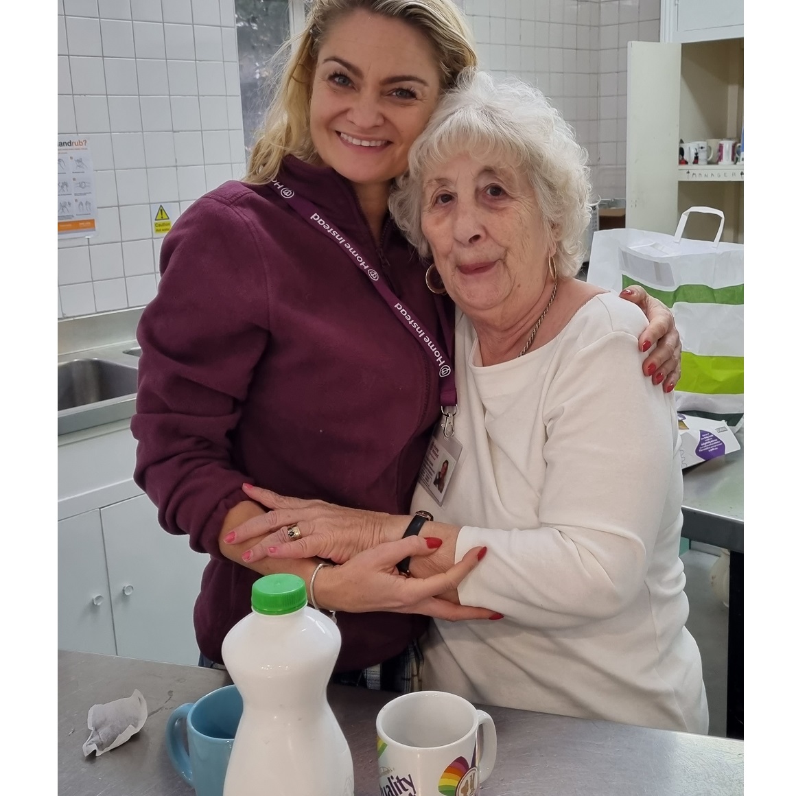 Ania from Home Instead Enfield (left) with memory club visitor Cherry (right)