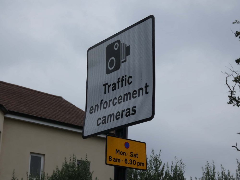 A sign warning drivers about traffic enforcement cameras in Fox Lane