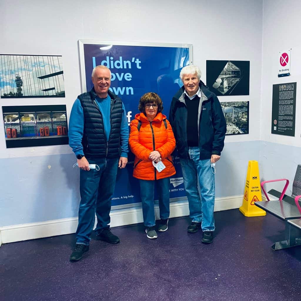 Pictured at the new exhibition space at Gordon Hill Station are Andrew Ridley, chair of Edmonton Camera Club, visitor Chris, and Roland Bermel
