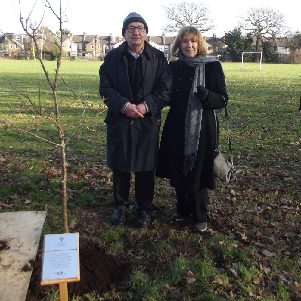 Mendel Markinson and Annie Doctors planted a tree at Bush Hill Park in memory of their mother Feiga Markinson, a Jewish refugee who fled Nazi Germany