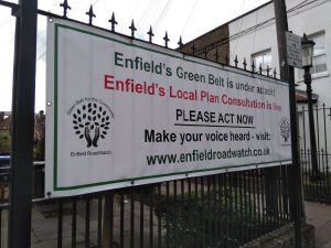 An Enfield Road Watch campaign banner in Enfield Town