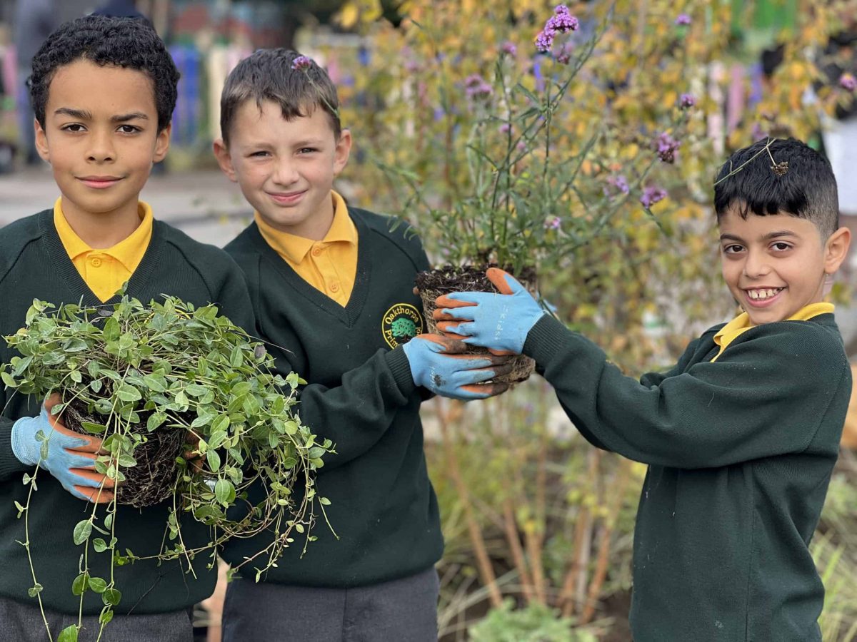 Oakthorpe Primary School pupils helping to plant rain garden (credit Enfield Council)