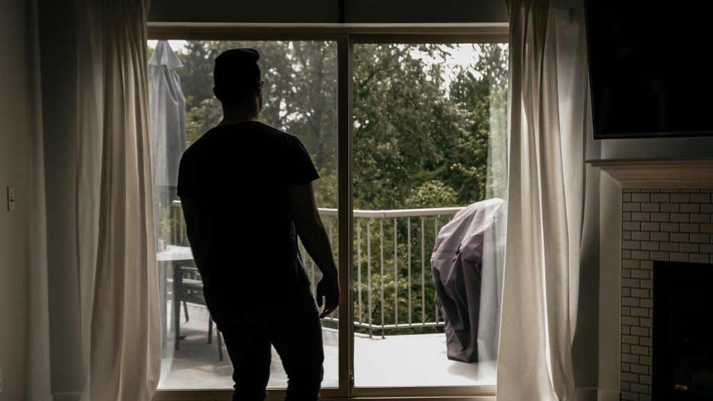 Renter looking out of a window