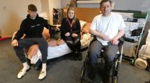 At their room in Enfield Travelodge (from left) are son Alan, dog Apollo, mum Magda and dad Piotr