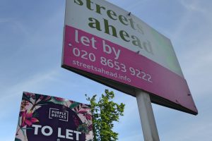 Estate agent letting signs