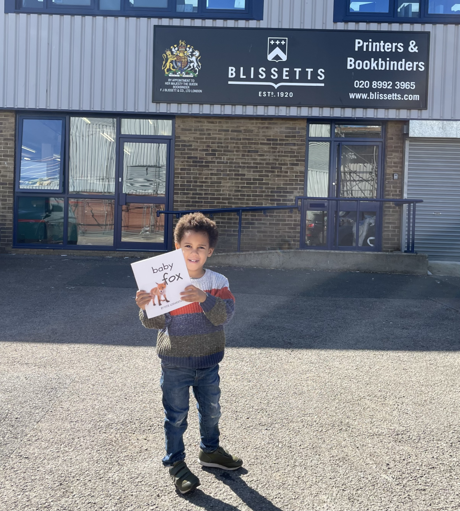 Esse collecting his book from the printers