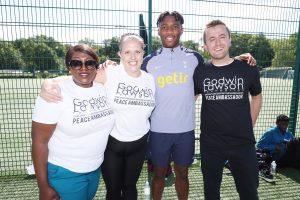 Spurs star Destiny Udogie with Yvonne Godwin
