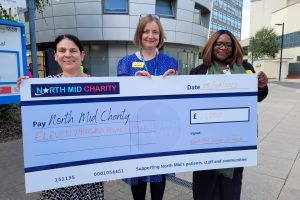 The donation presented to North Mid Charity