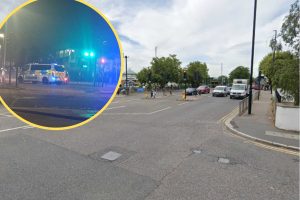 The junction of Southbury Road and Baird Road where the collision took place and (inset) police on the scene last night