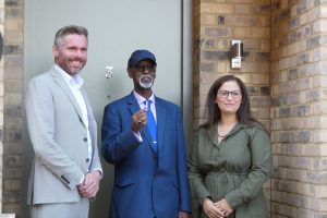 Enfield Council leader Nesil Caliskan (right) with one of the first new residents at Meridian Water and (left) deputy mayor of London Tom Copley