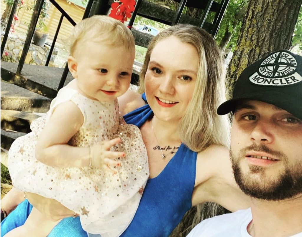 Paige and Tom Ballmi with their daughter