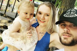 Paige and Tom Ballmi with their daughter