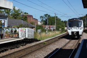 A Great Northern train approaching Enfield Chase Station