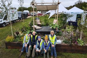 Capel Manor College students and the finished build of their show garden