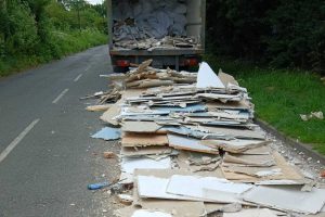 Building waste dumped in Picketts Lock Lane