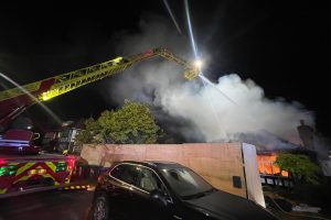 Firefighters tackle the blaze in Ringmer Place, Bush Hill Park (credit LFB)