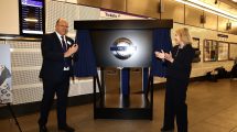 London's transport commissioner Andy Lord and London Transport Museum CEO Elizabeth McKay unveil the TfL 25th anniversary roundel (credit Transport for London)