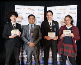 Pictured from left to right; third place Demir Seyranoglu, Enfield mayor Mohammad Islam, first place Adam Ravat, and second place Helena Carvalho