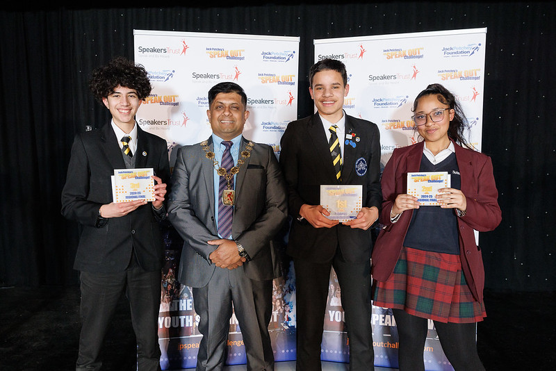 Pictured from left to right; third place Demir Seyranoglu, Enfield mayor Mohammad Islam, first place Adam Ravat, and second place Helena Carvalho