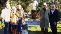 The new sign unveiled with help from Barney's owner Chris Smith (third from left), Town ward councillor Mike Rye (second from right) and local resident Alan Boyle (right) who launched the petition