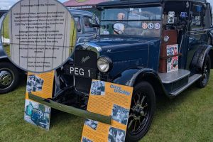 Enfield Pageant of Motoring and (inset) a notice apologising for the ticketing error (credit Malcolm Williams)