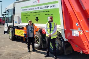 Cabinet member for environment Rick Jewell (left) and council leader Ergin Erbil (right) with one of the new bin lorries