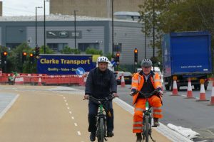 On their bikes are cabinet member Sabri Ozaydin (left) and Simon Milligan, project director for Taylor Woodrow (right)
