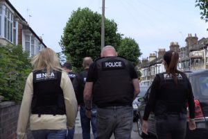 The scene in Edmonton as arrests made (credit NCA)