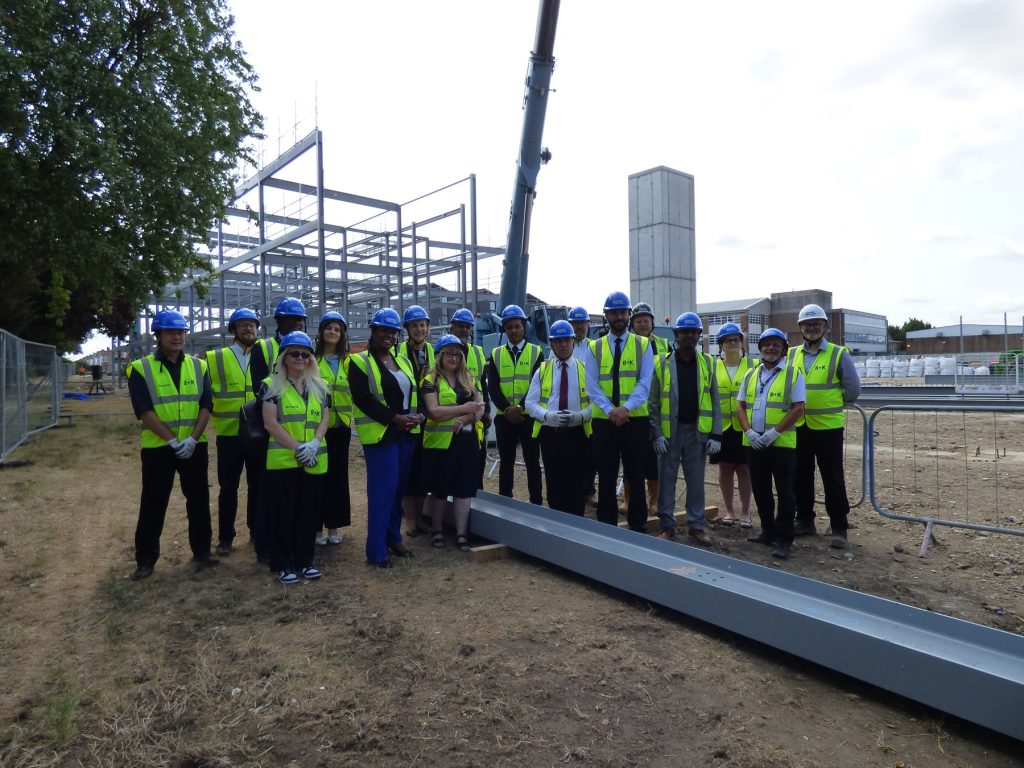 Local leaders, school staff and pupils on the building site at Chace Community School