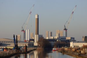 The new incinerator under construction, as the old one continues to burn the borough's waste