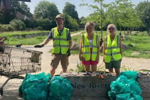 Members of Winchmore Warriors with a trolley rescued from the New River and other bags of waste collected nearby