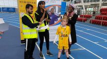 Children receive their medals at Lee Valley Athletics Centre during the SEN Sports Champions Inclusive Athletics Event