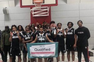 The Capital City Cobras basketball team celebrate their win