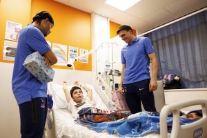 Joao Palhinha and Xavi Simons of Tottenham Hotspur visit North Middlesex Hospital’s children's ward