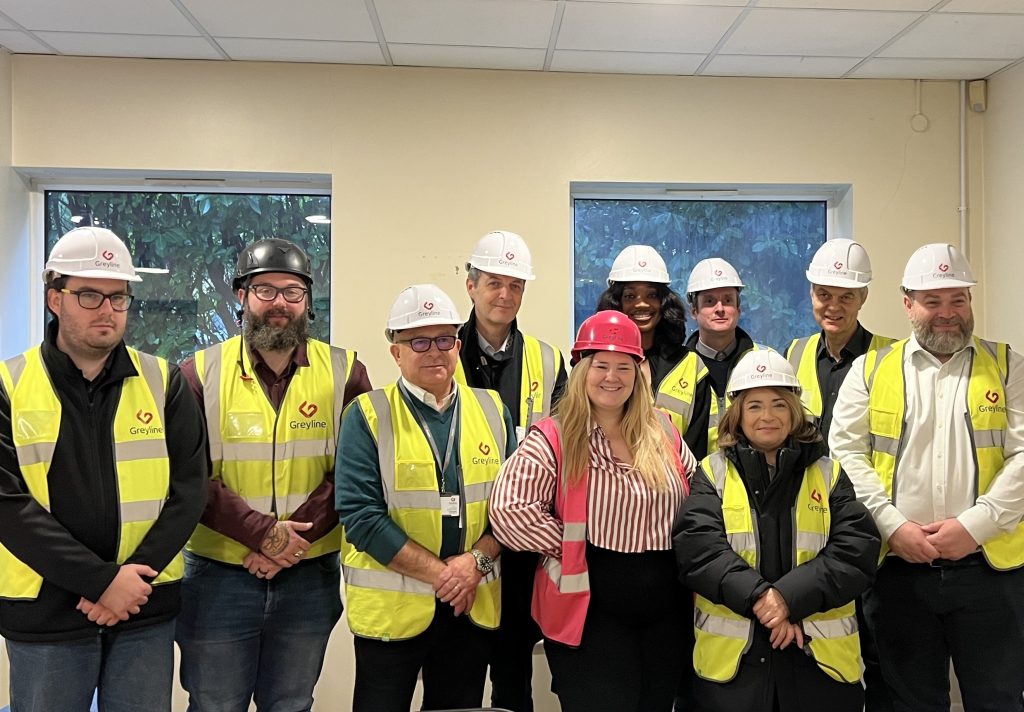 Council cabinet member Alev Cazimoglu (third from right) joined the Greyline team and council officers on site