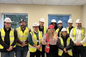 Council cabinet member Alev Cazimoglu (third from right) joined the Greyline team and council officers on site