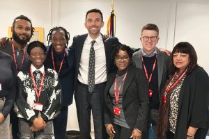Minister for Children Josh MacAlister (centre) meets Enfield care leavers, including Jim Wasswa (third from left)