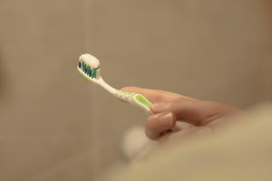 Toothbrushing (credit Roman Marchenko via Unsplash)