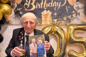 Donald Howkins with his birthday card from the King