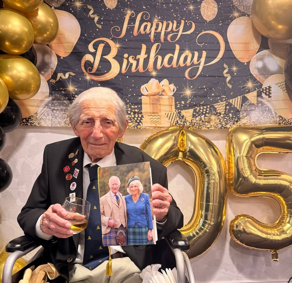 Donald Howkins with his birthday card from the King