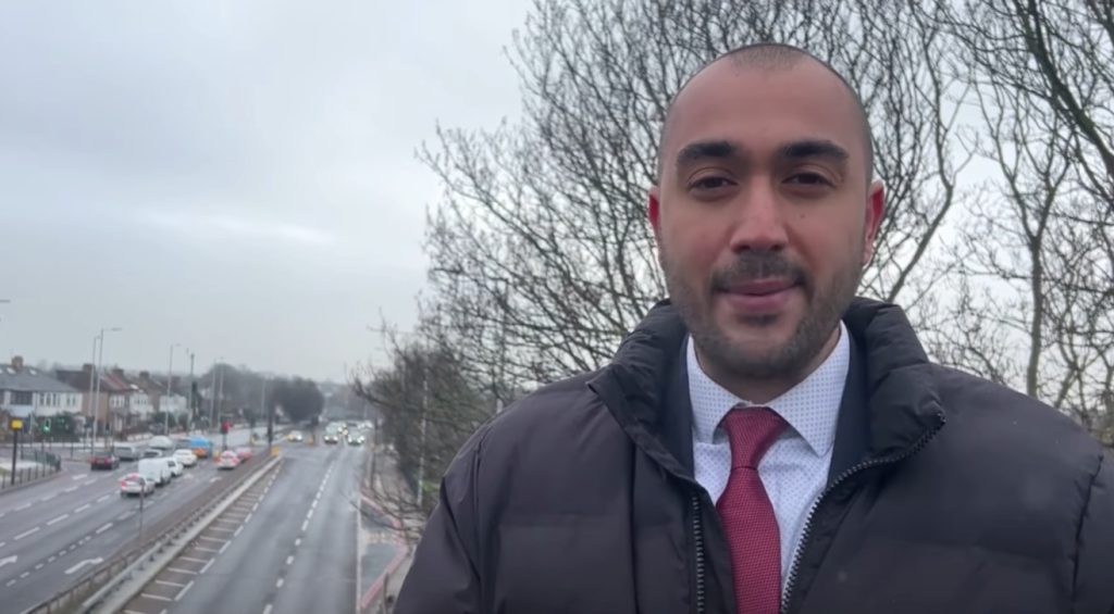Council leader Ergin Erbil beside the A10 (credit Enfield Council)