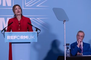 Reform UK's London mayoral candidate Laila Cunningham on stage with leader Nigel Farage (credit Facundo Arrizabalaga-MyLondon)