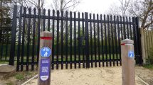 A large padlocked gate currently blocks access to the remaining part of the New River walking and cycling route
