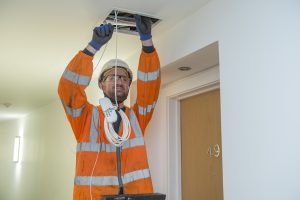 BT Openreach fibre engineers connecting apartments (credit Sean Spencer/Openreach)